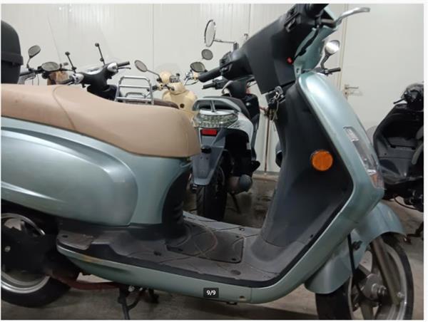 Grote foto opknapper sym fiddle met weinig km fietsen en brommers scooters