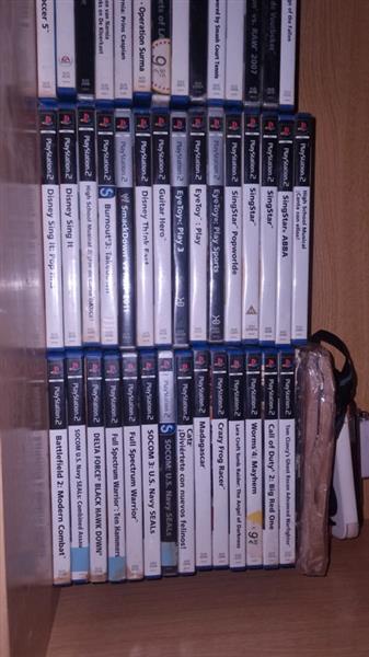 Grote foto playstation 2 65 games in caft hobby en vrije tijd overige hobby en vrije tijd