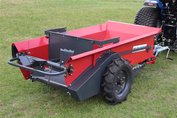 Grote foto mini mestverspreider wielaangedreven agrarisch mechanisatie