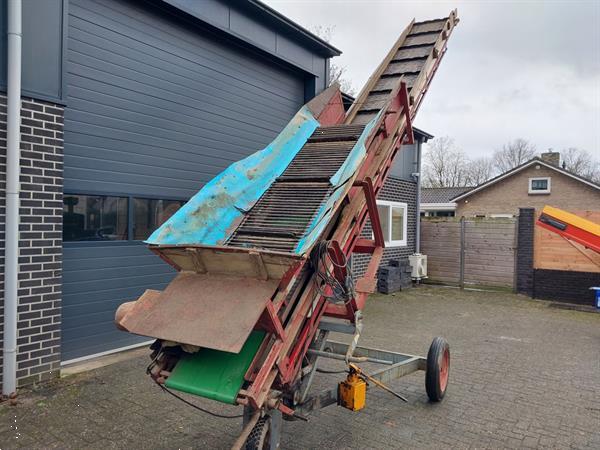 Grote foto hofstee boxenvuller transportband agrarisch kisten