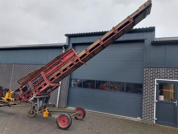 Grote foto hofstee boxenvuller transportband agrarisch kisten