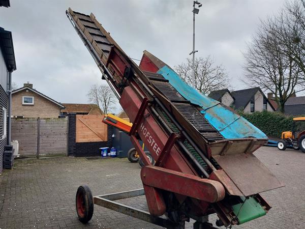 Grote foto hofstee boxenvuller transportband agrarisch kisten