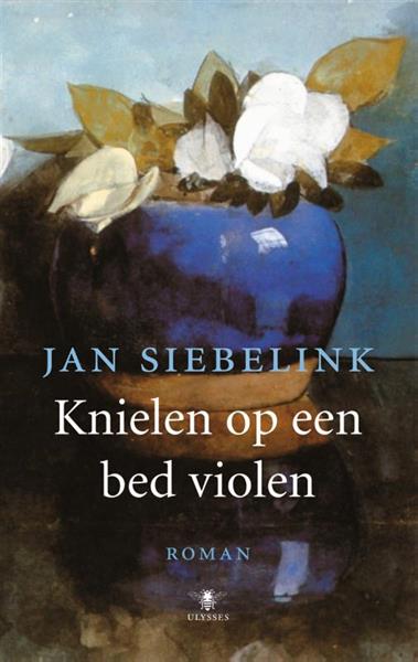 Grote foto knielen op een bed violen boeken overige boeken