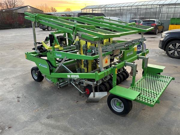 Grote foto hortech due automatica 194 4 row mulchfolie plantmachine voor perspotten agrarisch zaaimachines