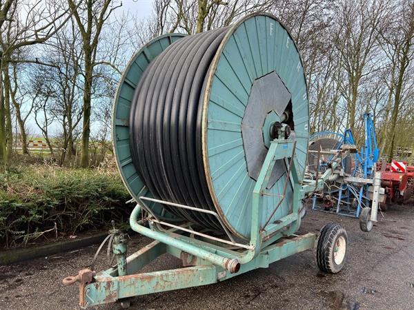 Grote foto ferbo met slang 410 en diameter 100 optioneel met pomp agrarisch beregeningapparatuur