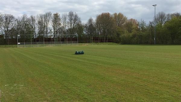Grote foto belrobotics robotmaaier tuin en terras kooimaaiers