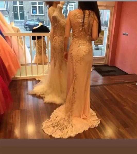 Grote foto winkel ter overname dames avond gala kleding zakelijke goederen exploitaties en overnames