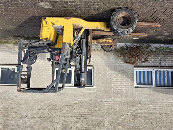 Grote foto kooiaap meeneem heftruck ruwtereinheftruck triplo agrarisch heftrucks