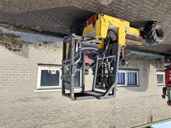 Grote foto kooiaap meeneem heftruck ruwtereinheftruck triplo agrarisch heftrucks