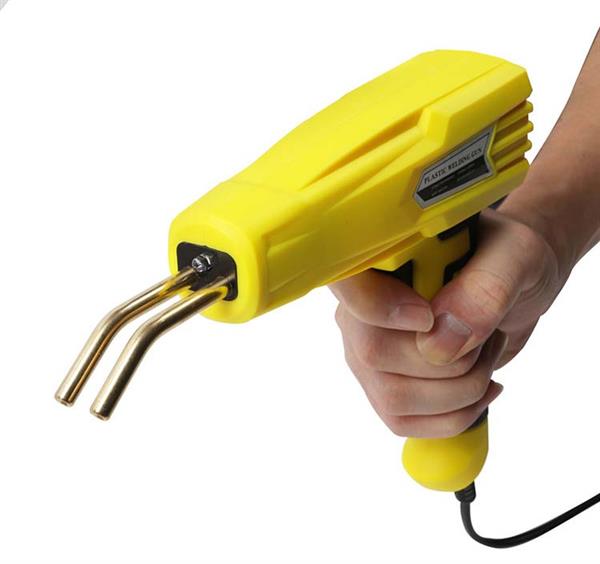 Grote foto kunststof plastic laspistool geel auto onderdelen auto gereedschap