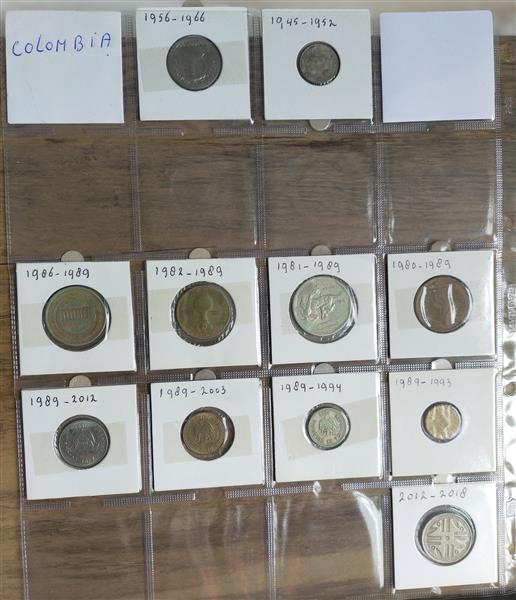 Grote foto 1850 munten in 9 albums uit de gehele ereld postzegels en munten overig