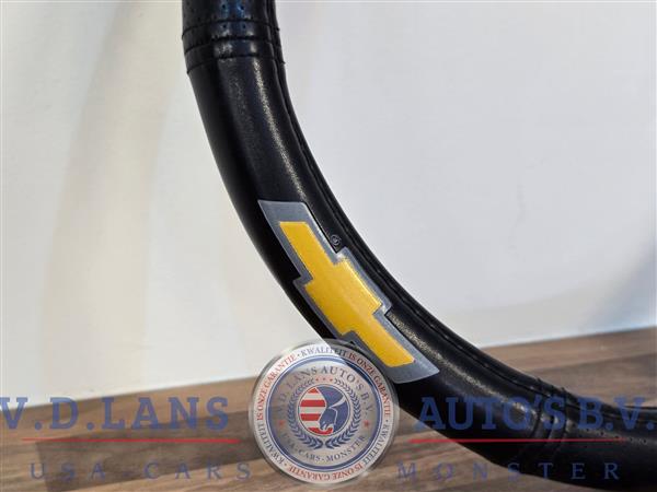 Grote foto gebruikte chevrolet stuurhoes zwart geel 38 cm auto onderdelen overige auto onderdelen