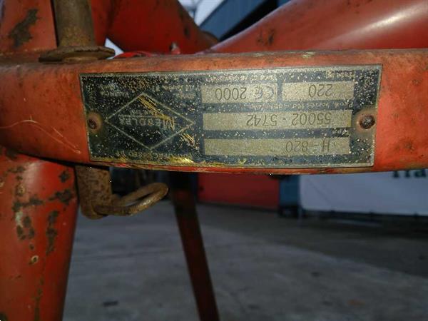 Grote foto hooiacrobaat agrarisch harken