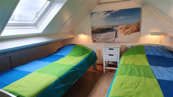Grote foto de zon in zeeland naast het strand. vakantie strandvakanties