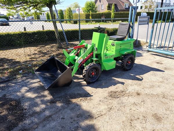 Grote foto minishovel 4x4 electrisch demo agrarisch shovels