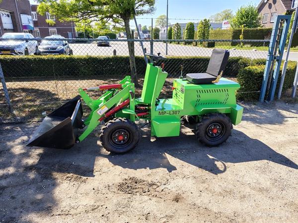 Grote foto minishovel 4x4 electrisch demo agrarisch shovels