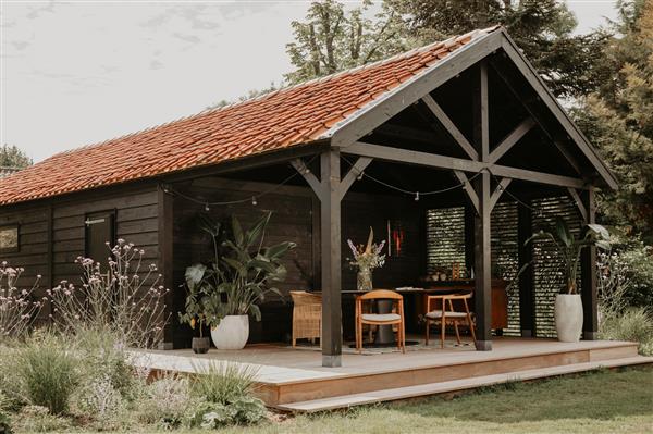 Grote foto maatwerk douglas houten bijgebouwen op maat. tuin en terras tuinhuisjes en blokhutten