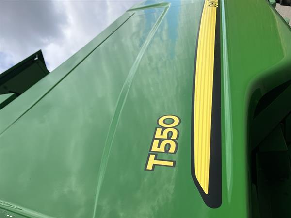Grote foto john deere t560 agrarisch maaidorsers