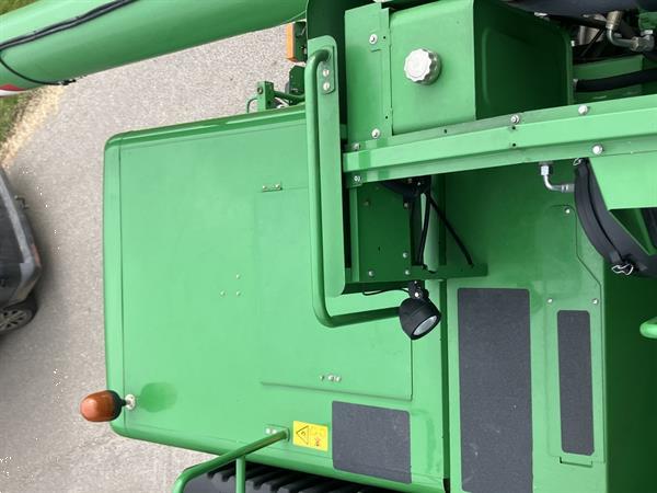 Grote foto john deere t560 agrarisch maaidorsers