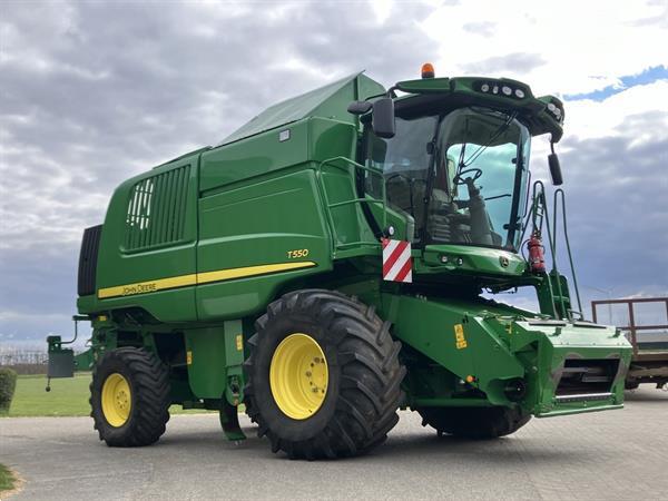 Grote foto john deere t560 agrarisch maaidorsers