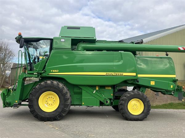 Grote foto john deere t560 agrarisch maaidorsers