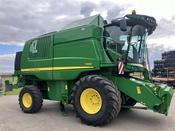 Grote foto john deere t560 agrarisch maaidorsers