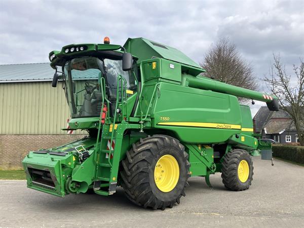 Grote foto john deere t560 agrarisch maaidorsers