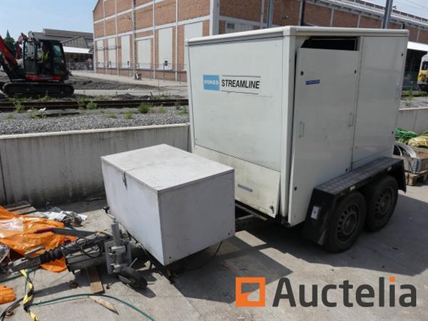 Grote foto aanhangwagen met vokes stroomlijnt het oliefiltratiesysteem agrarisch aanhangwagens