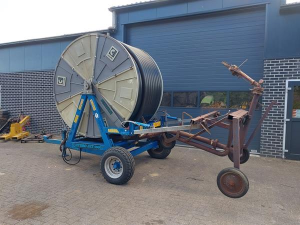 Grote foto casella hydro jet 100 280 beregeningshaspel met computer agrarisch beregeningapparatuur