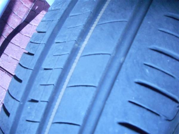 Grote foto 4 zeer goede banden met velg en wieldeksels auto onderdelen banden en velgen