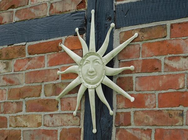Grote foto wandornament zon old white metaal tuin en terras tuindecoratie