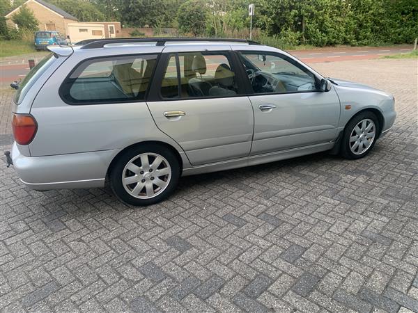 Grote foto nissan primera stationwagen automaat airco. auto nissan
