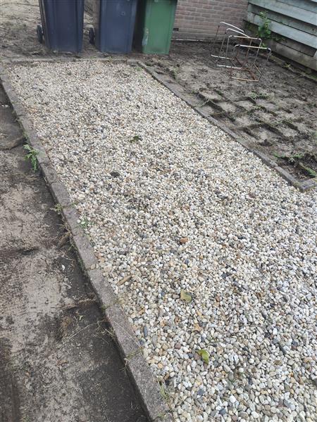 Grote foto grind tuin en terras tegels en terrasdelen