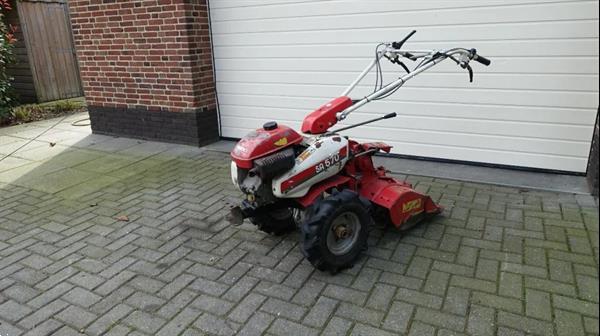 Grote foto iseki sa570 met tielburger frees agrarisch tractoren
