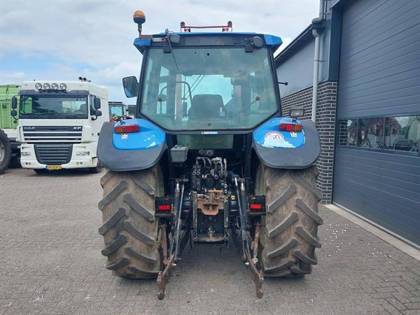Grote foto new holland ts 115 met frontlader agrarisch tractoren