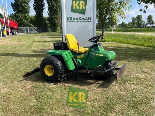 Grote foto john deere 1200a bunkerrake 690514 motoren buggy en quad