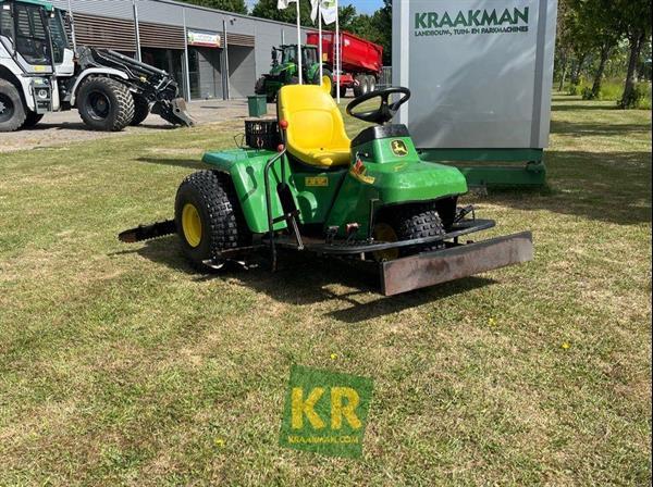 Grote foto john deere 1200a bunkerrake 690514 motoren buggy en quad