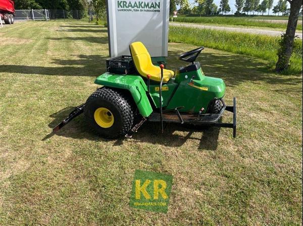 Grote foto john deere 1200a bunkerrake 690514 motoren buggy en quad