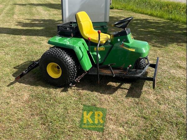 Grote foto john deere 1200a bunkerrake 690514 motoren buggy en quad