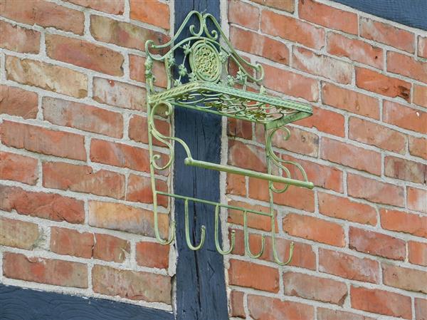 Grote foto vintage wandrek met haken old green smeedijzer huis en inrichting woningdecoratie