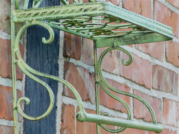 Grote foto vintage wandrek met haken old green smeedijzer huis en inrichting woningdecoratie