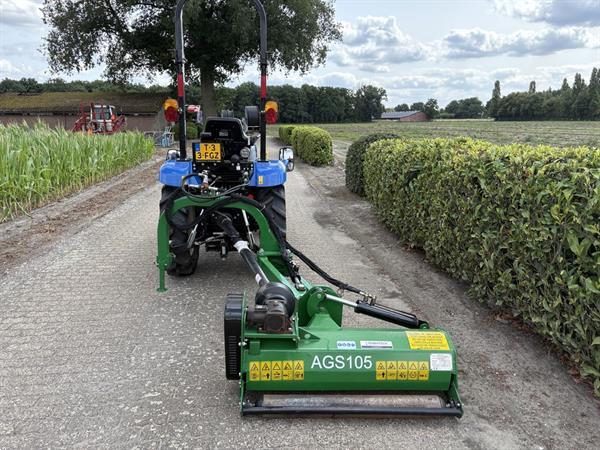 Grote foto new holland boomer 25 met klepelmaaier agrarisch tractoren