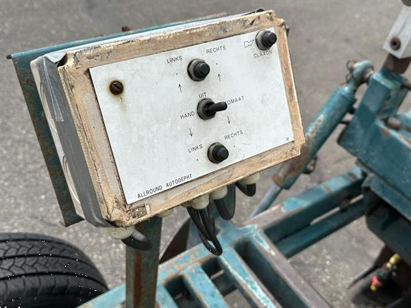 Grote foto allround uien bollen plantmachine agrarisch zaaimachines