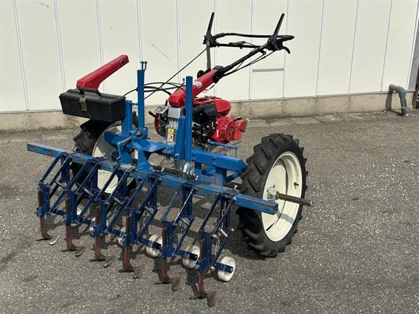 Grote foto hak schoffelmachine met honda motor agrarisch onkruidbestrijding