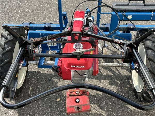 Grote foto hak schoffelmachine met honda motor agrarisch onkruidbestrijding