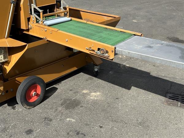 Grote foto javo rotofill trayvulmachine met rollenbaan agrarisch tuinbouw