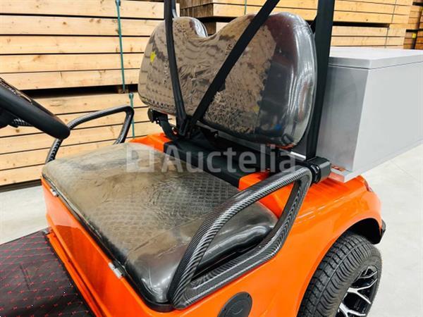 Grote foto rte golfkar met opslagbox oranje doe het zelf en verbouw hefwerktuigen