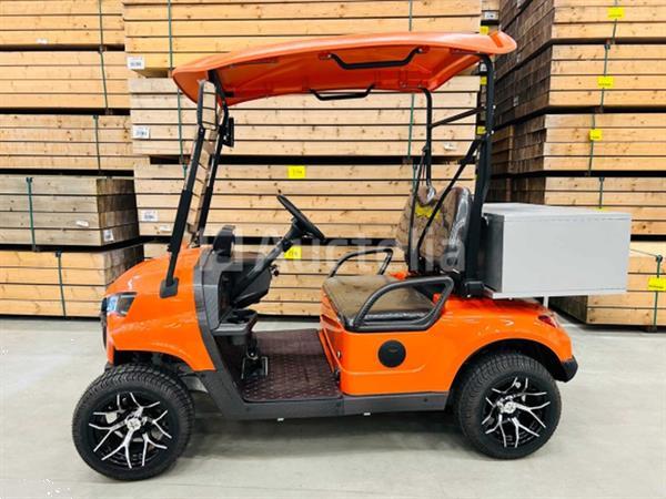 Grote foto rte golfkar met opslagbox oranje doe het zelf en verbouw hefwerktuigen