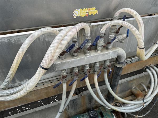 Grote foto peter cox wasmachine voor lente ui met blad en wortelsnijder agrarisch tuinbouw