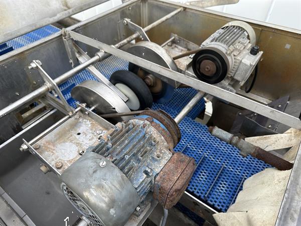 Grote foto peter cox wasmachine voor lente ui met blad en wortelsnijder agrarisch tuinbouw